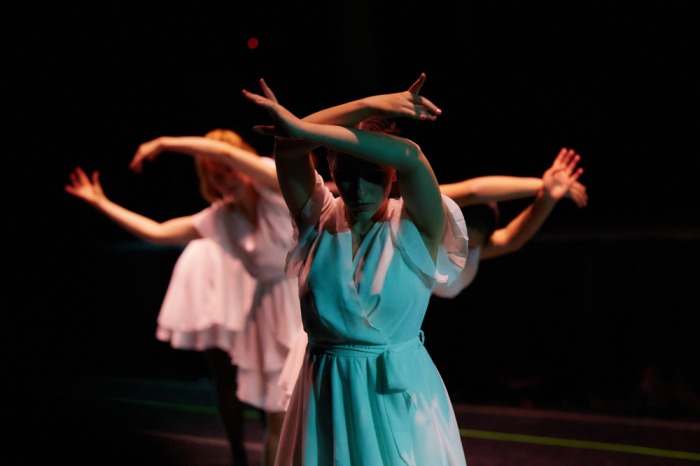 Students dance during a recital