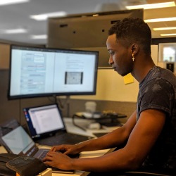 Man at his computer workstation