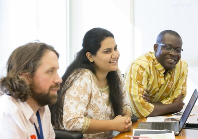 Image of graduate students in class.