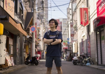 Study abroad student on a street in Kobe, Japan