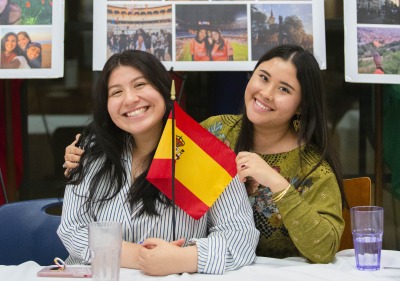 Image of students holding Spanish flag