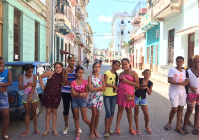 Image of children in a colorful Cuban street.