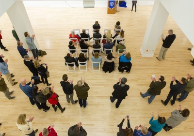 Image of people at an event in the art gallery.