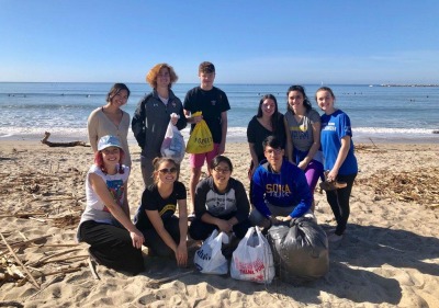 Photo of student-athletes at beach clean up activity