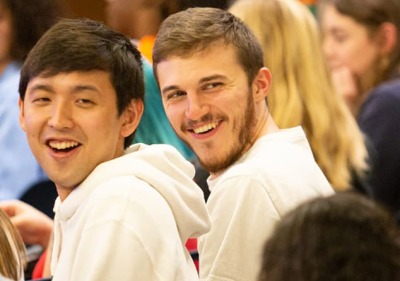 Students smiling during campus event