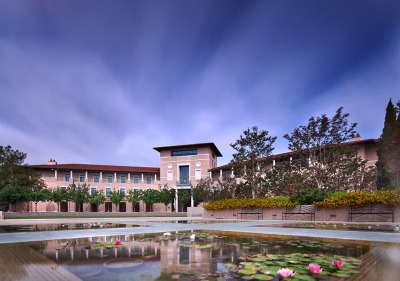 View of Ikeda Library with lily pond in the foreground