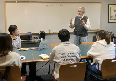 Larry instructing a writing workshop
