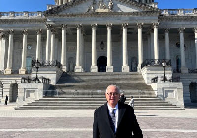 SUA President Ed Feasel stands in front of the U.S. Capitol Building in Washington, D.C.