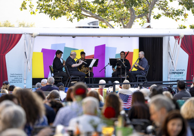 Pacific Symphony plays in front of a large crowd at SUA.