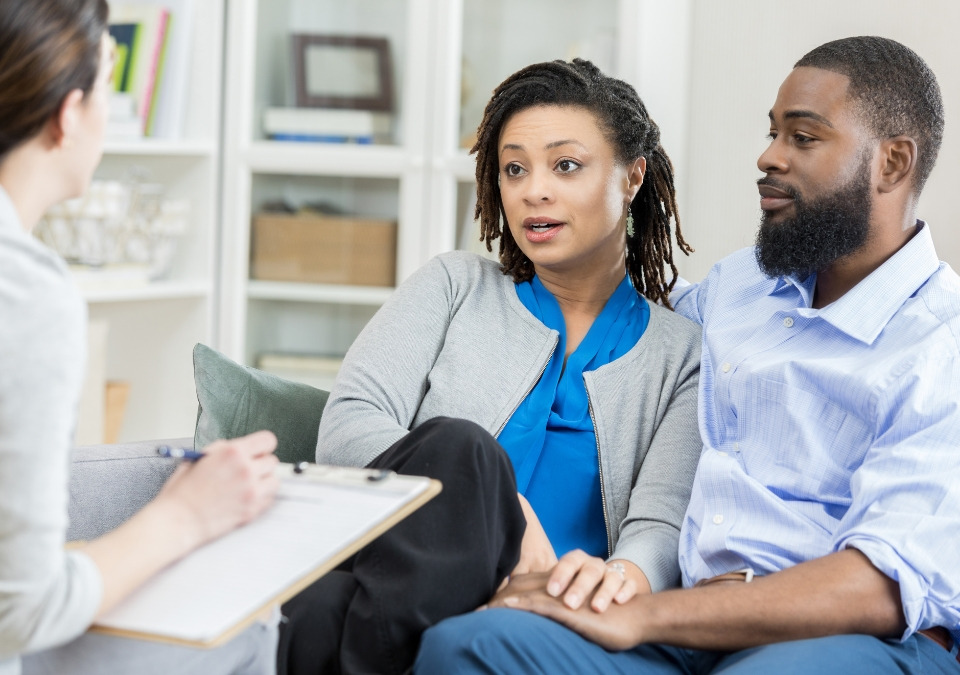 A doctor counseling the couple