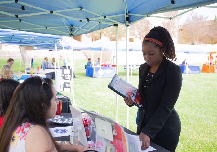 Image of student at career fair.