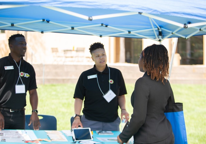 Image of a student at career fair.