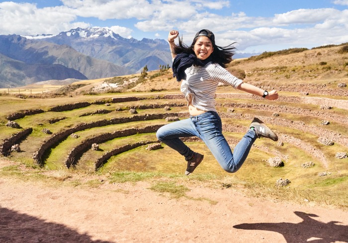 Ting jumping in front of Moray in Peru