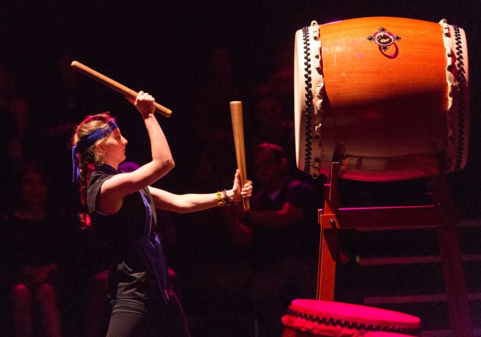 Image of student playing taiko drum