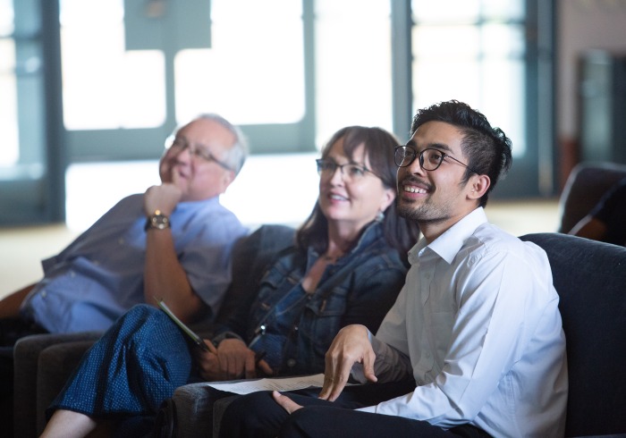 Image of students and faculty at lecture