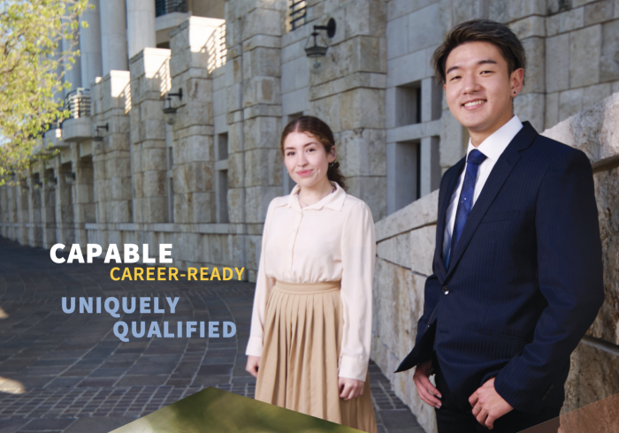 Two Soka students dressed in career attire standing outside Founders Hall