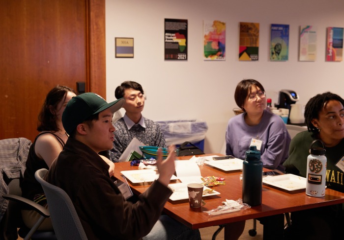 Members of DEI participate in a discussion