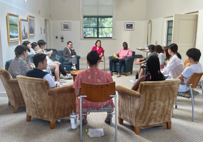 DEI Staff participate in a group discussion