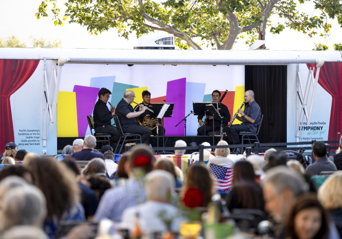 Pacific Symphony plays in front of a large crowd at SUA.