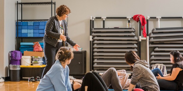 Image of instructor giving directions in health class.