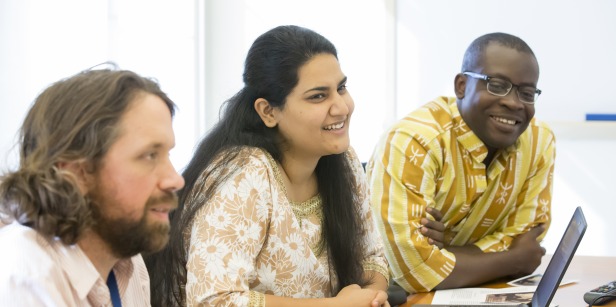 Image of graduate students in class.