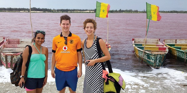 Student near the famously pink waters of Lake Retba in Senegal