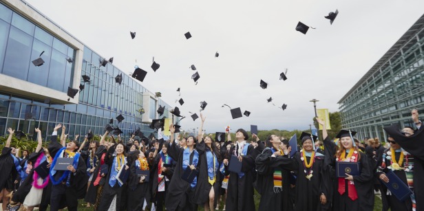 2023 SUA Graduates throw their caps in celebration