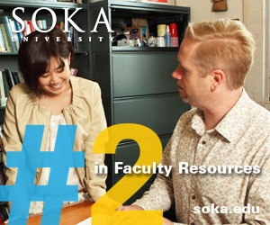 Image of a student talking to a professor.