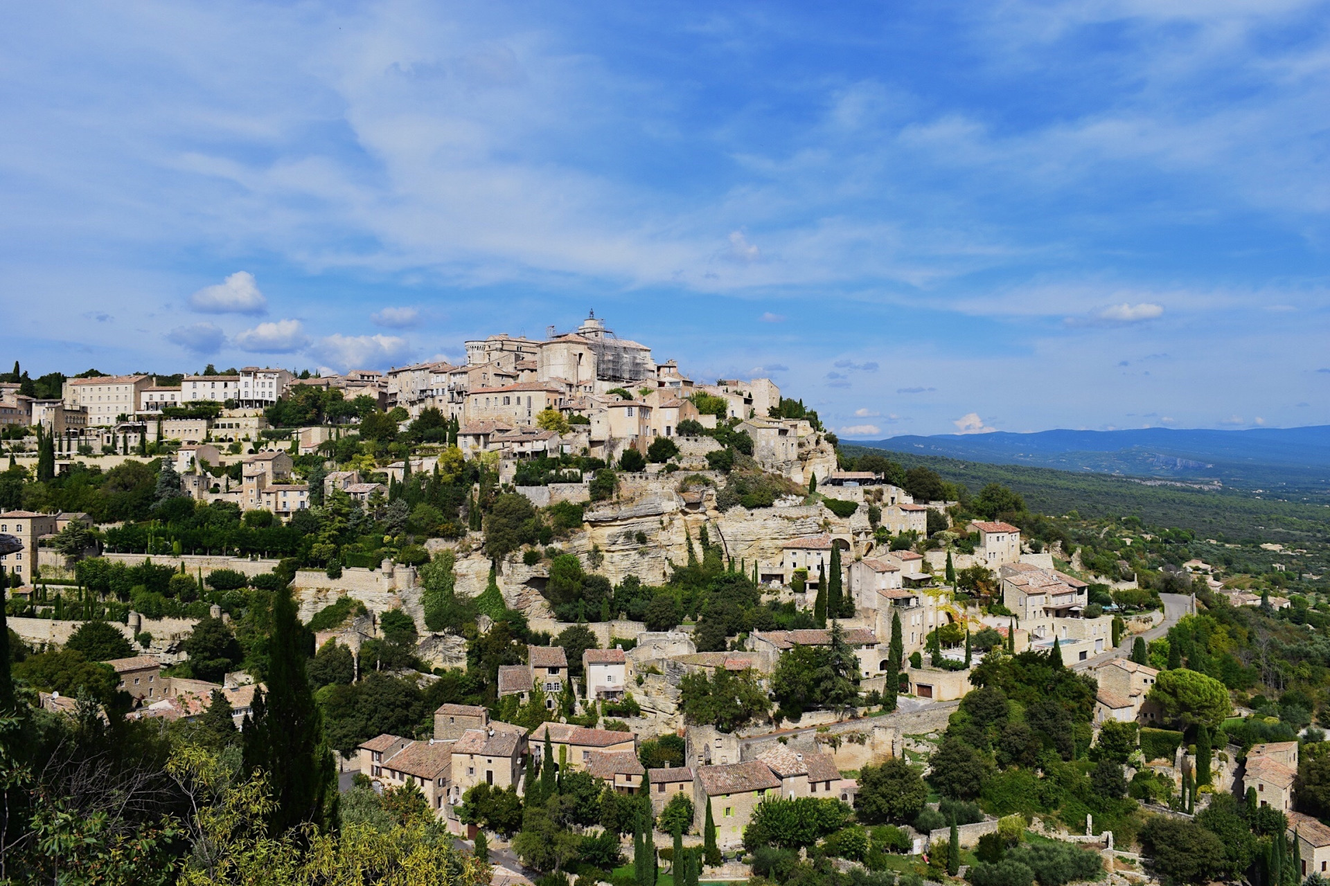 Mountain covered in buildings in France