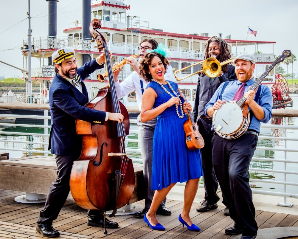 Jazzy Ash and Leaping Lizards on dock with instruments