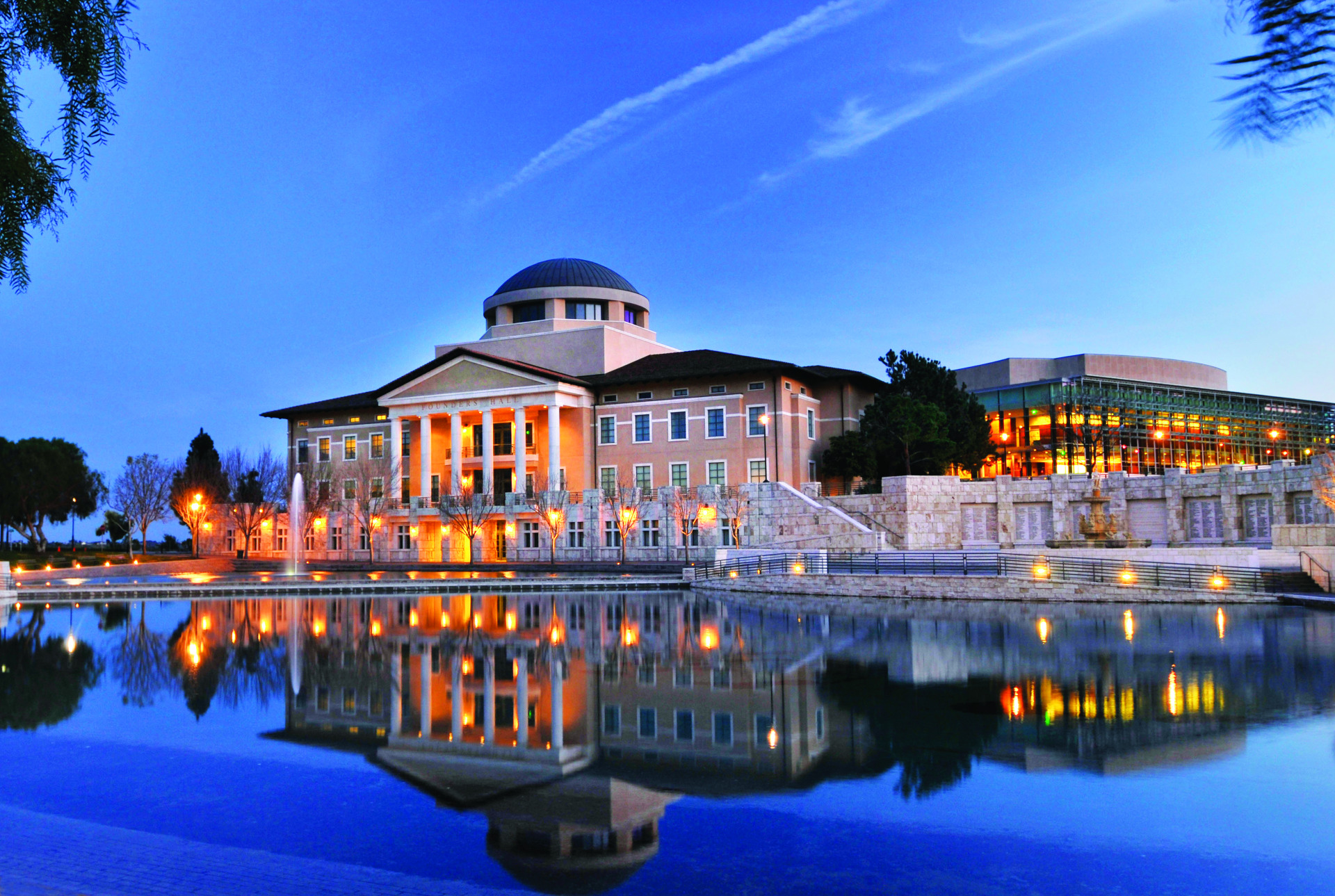 Founders Hall and Peace Lake calm and blue