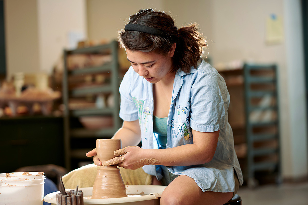 Katelynn Jankowiak at the potters wheel