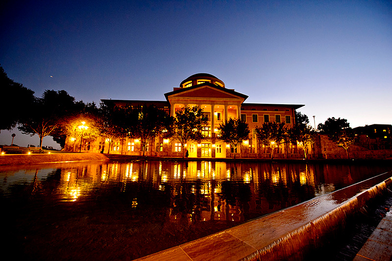 Soka Founders Hall lighted up in the evening