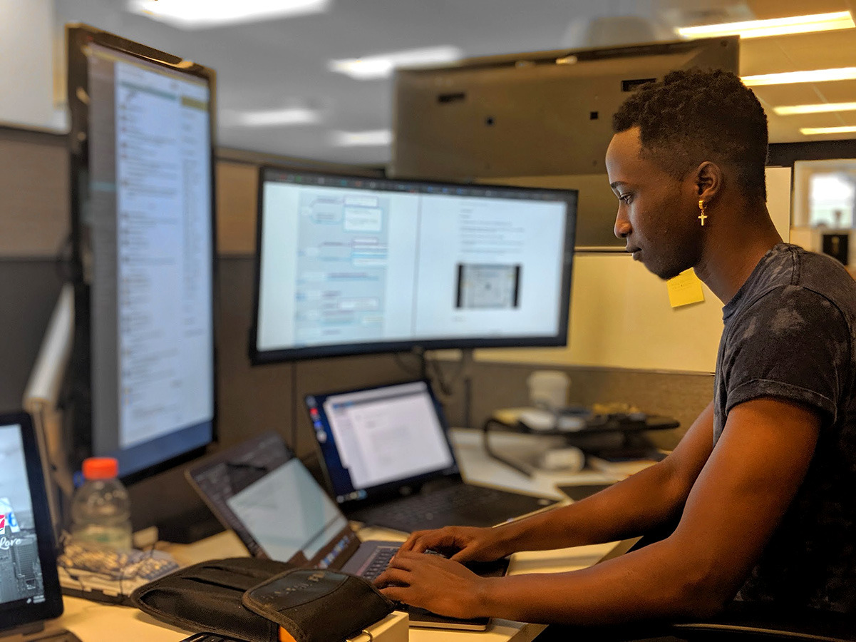 Man at his computer workstation