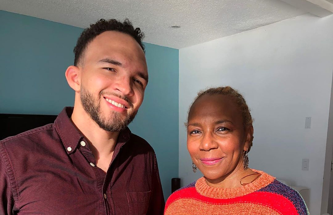 Man and Woman smiling at camera
