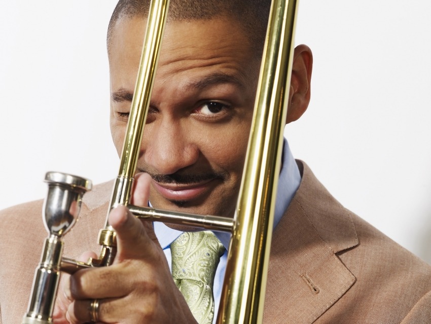 Delfeayo Marsalis holding horn