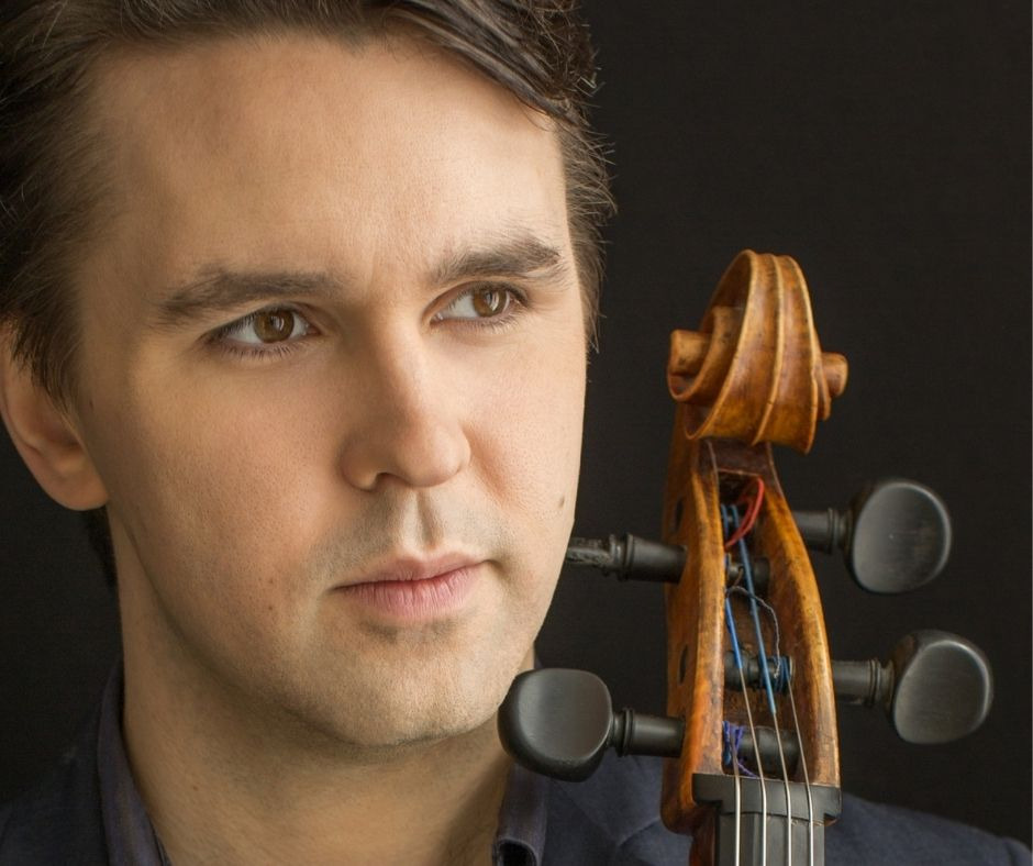 Andrew Janss holding cello