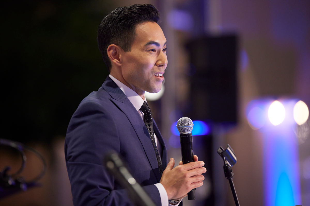 Master of Ceremonies Gene Kang speaks to the Gala attendees