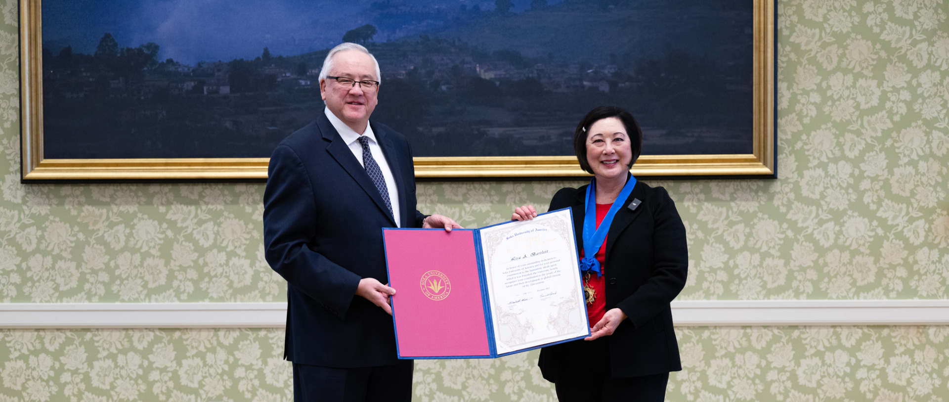 Soka President Ed Feasel presents Orange County Supervisor Lisa Bartlett with SUA’s Highest Award of Honor