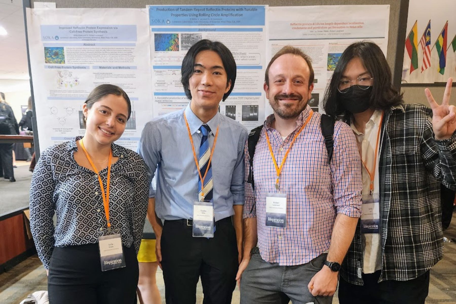 Prof Robert Levenson poses with three Soka Undergraduates