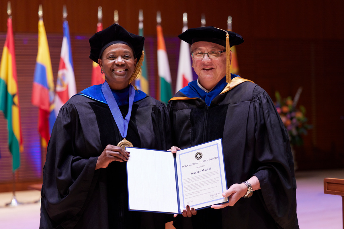 Wanjira Mathai smiles with President Feasel as she accepts the Soka Global Citizen Award