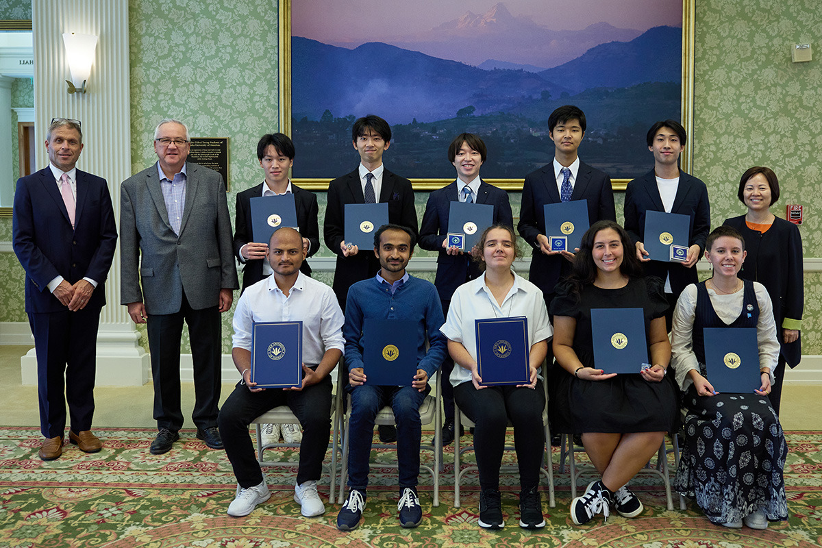 2023 scholarship awardees with university officials 