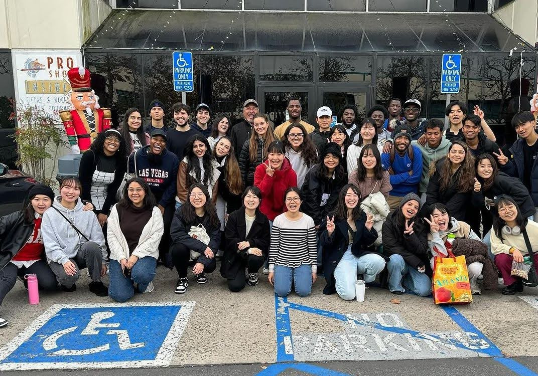 Councilman Ross Chun poses with a large group of students in front of the Aliso Viejo Ice Palace.