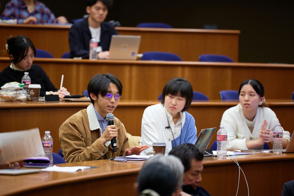 Symposium participants take part in an interactive discussion