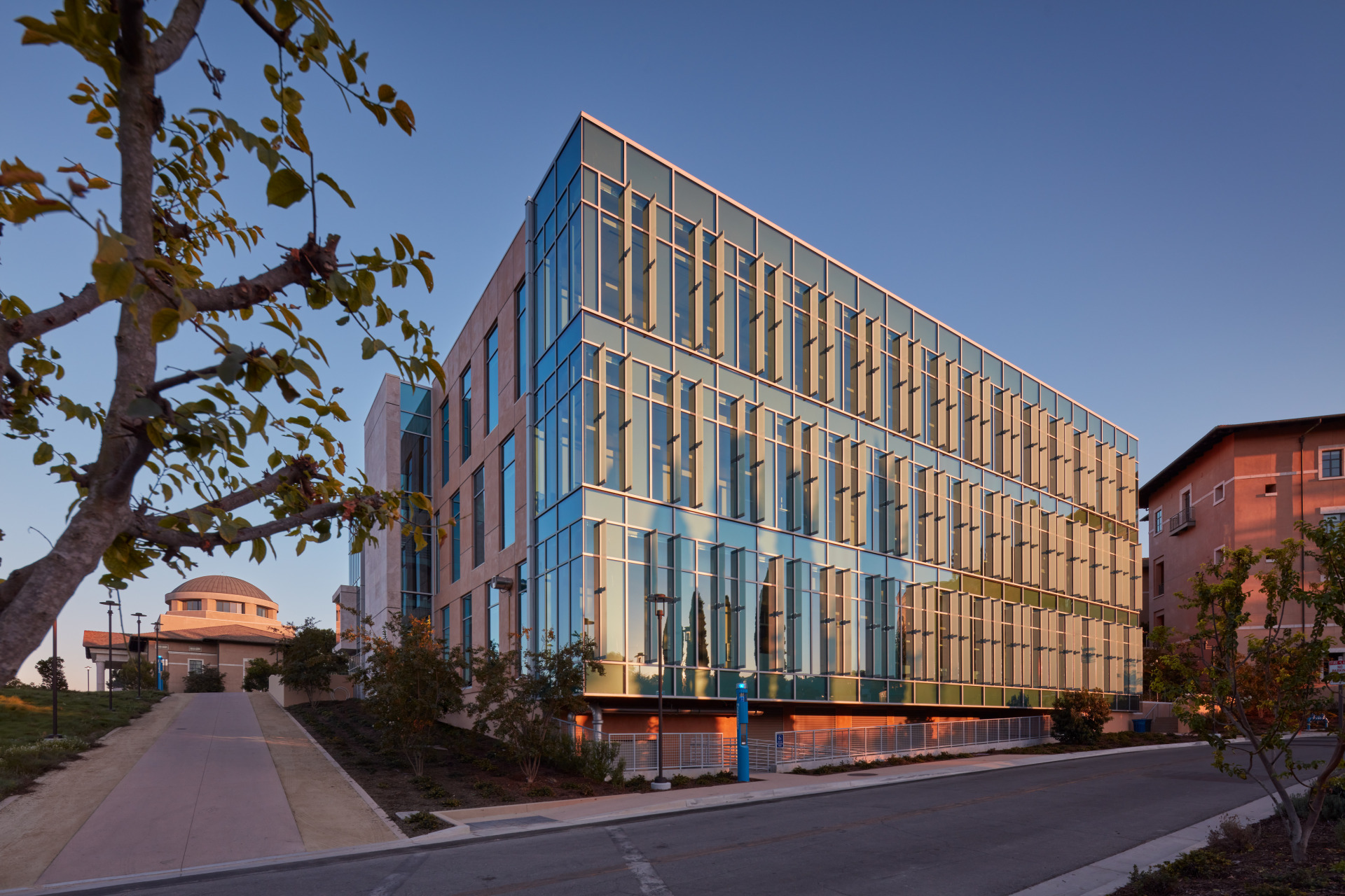 Sunlight reflects off Curie Hall on SUA's campus.