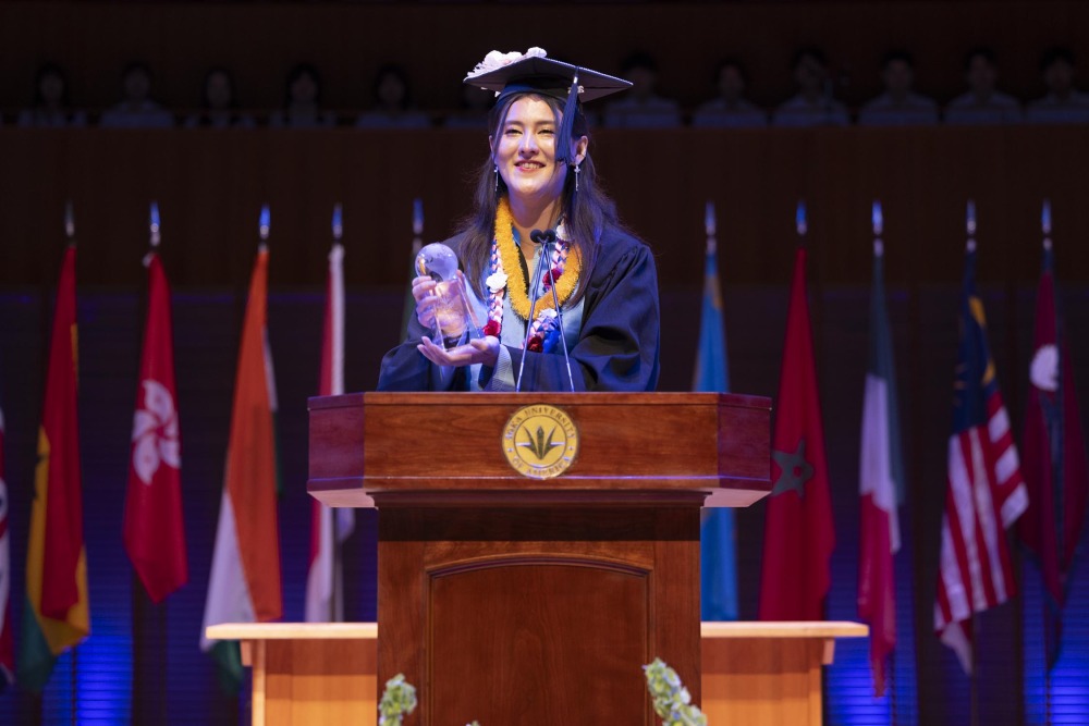 Julia Miyagawa Braga ’25 delivers remarks after receiving the Founder’s Award.