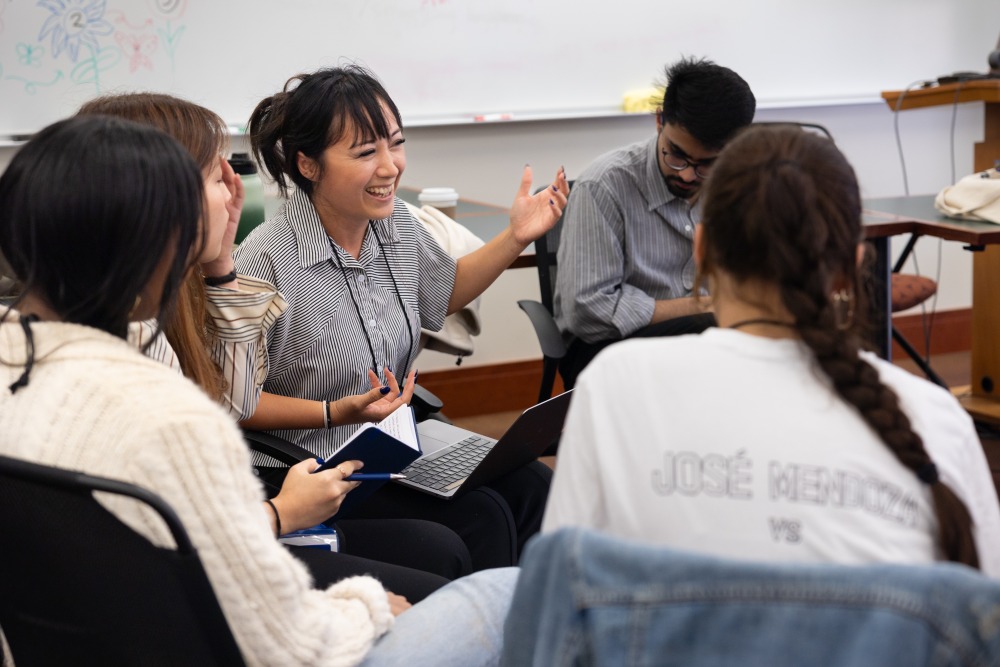 A participant shares her experiences during a roundtable discussion on June 11.