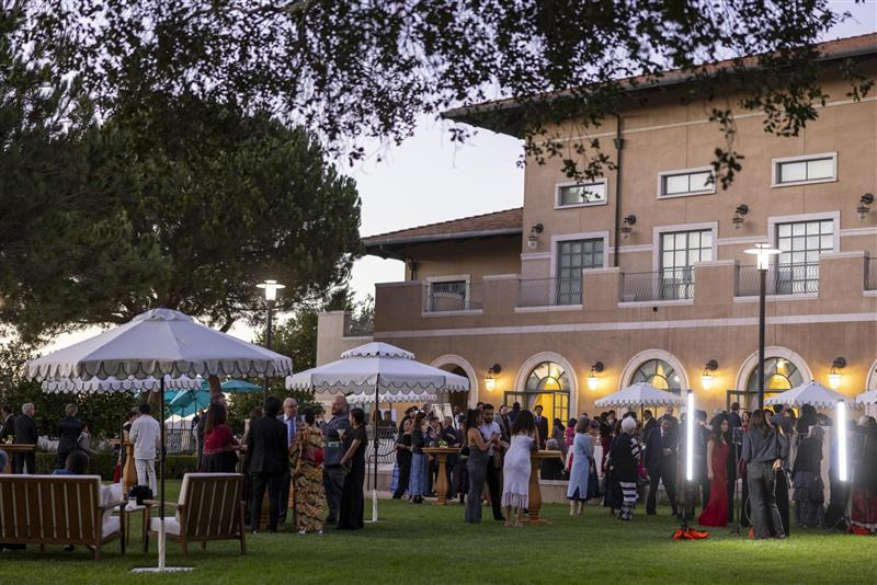 Gala attendees mingle in the Athenaeum courtyard during the 21st annual Peace Gala