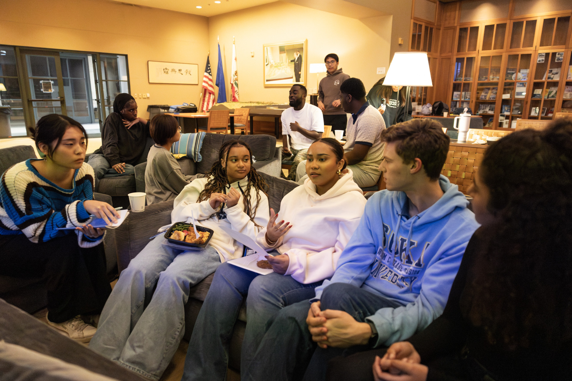 Students sit on a couch and discuss “Citizen King,” a documentary examining the final years of Dr. King’s life