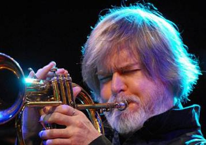 Tom Harrell playing the trumpet in concert